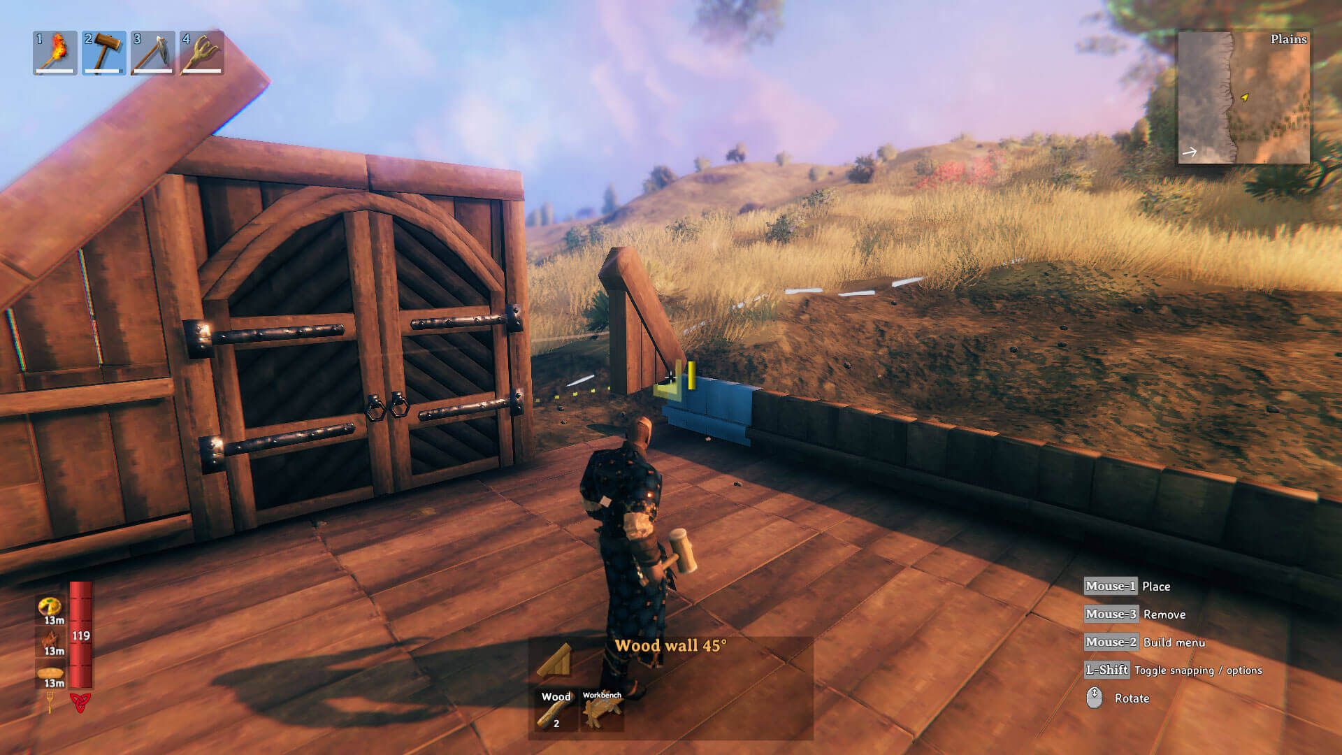 A Valheim player standing beside a timber base